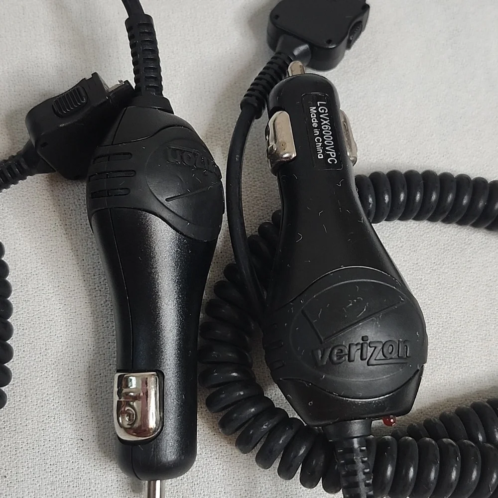 Assorted Vintage Electronic Charging Cables and Cases